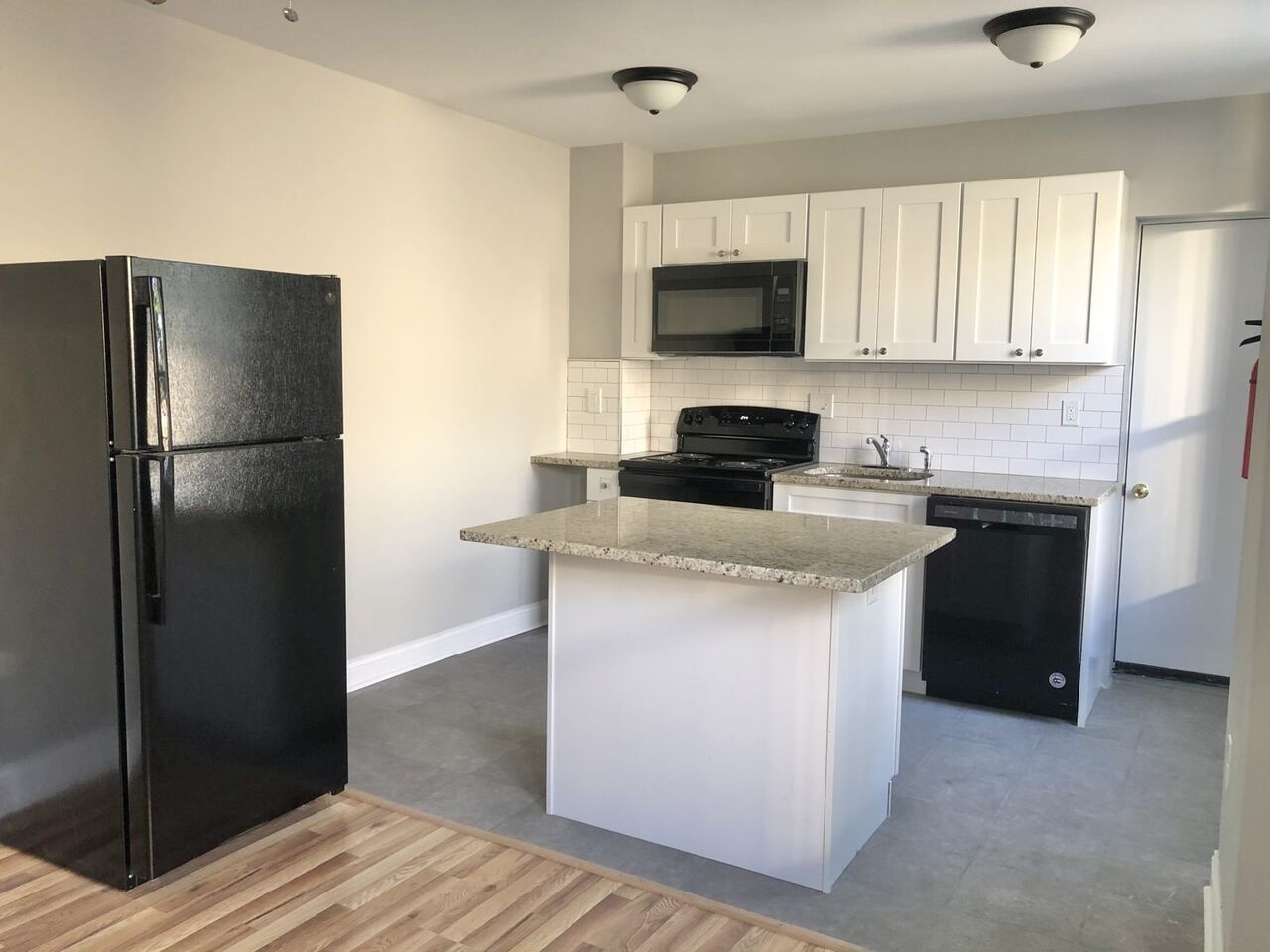 Kitchen with a freestanding granite island